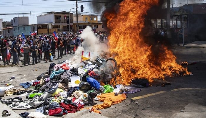 Al menos cuatro personas serán imputadas en Chile por la quema de las carpas de migrantes venezolanos