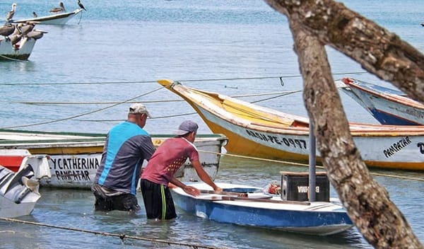 Pescadores de playa moreno