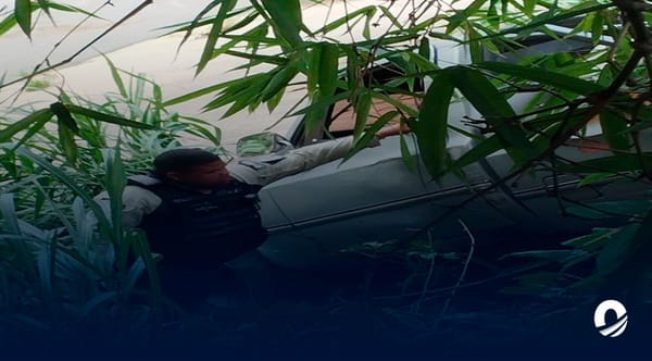Auto caído río Guaire Miranda